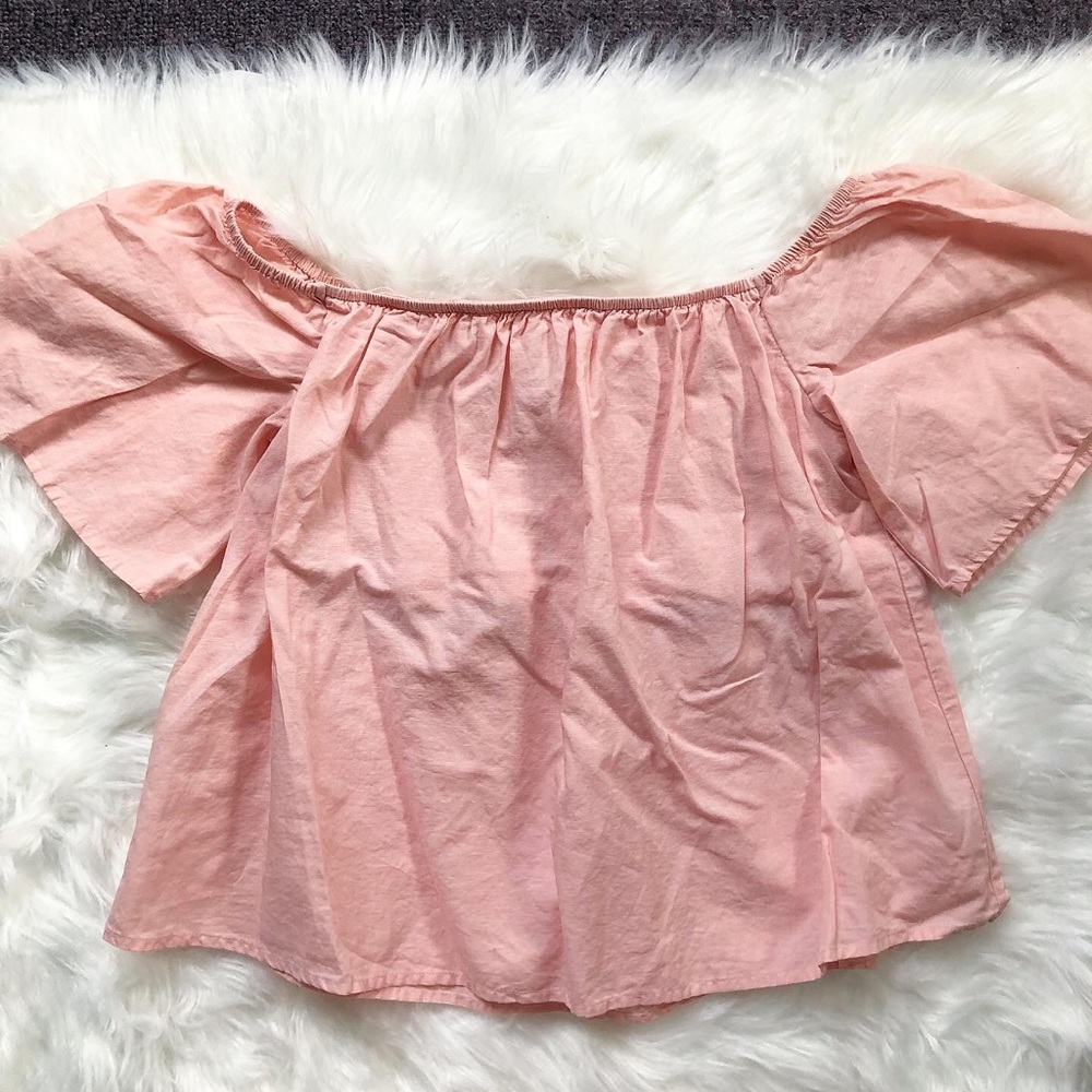 Express light pink off the shoulder smocked top